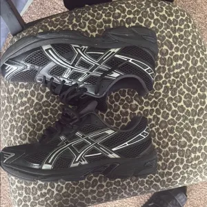 Asics Black and Silver Athletic Shoes with Signature Stripes