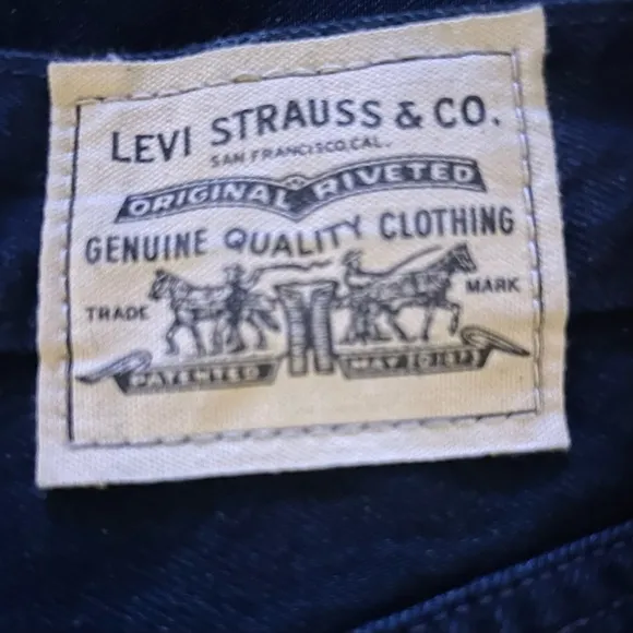 LEVI’S premium high loose 90’s jeans dark blue denim baggy leg 26”