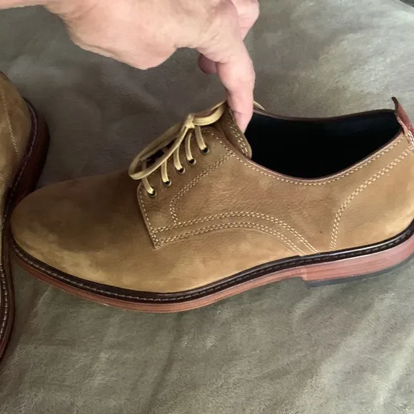 Men’s Cole Haan, 8 1/2 unworn suede Camel in color. Mild scuff on the ba…