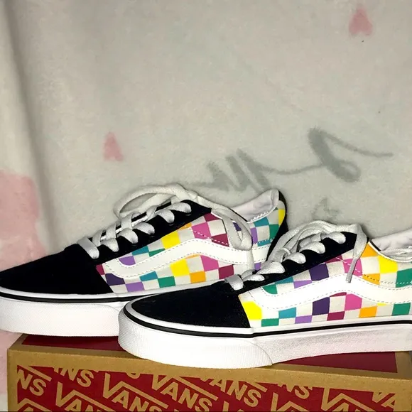 multiple checkered colored vans
