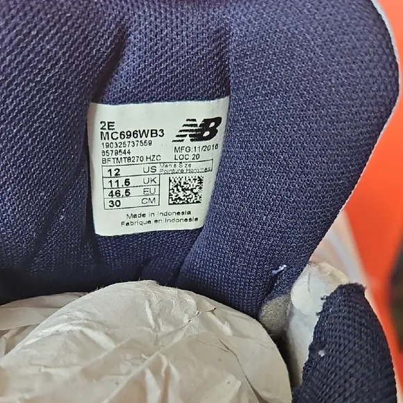 New Balance White and Blue Athletic Shoes with Gradient Design