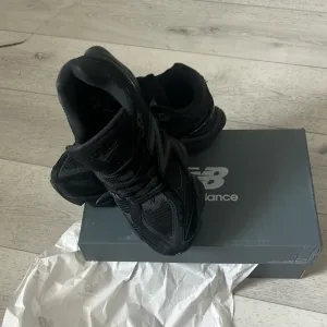 New Balance Women's Black Sneakers