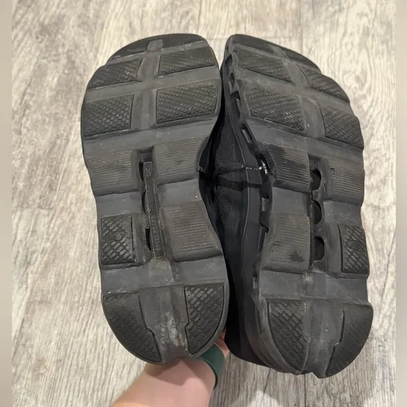 On cloudmonster black on black running shoes