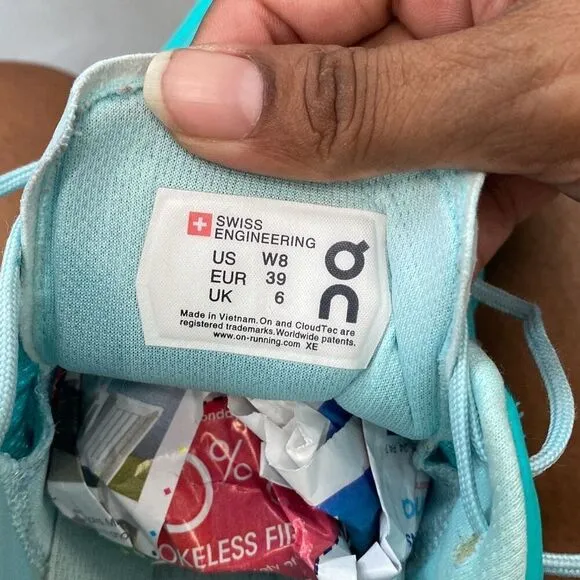 On cloud sneakers, women’s size 8