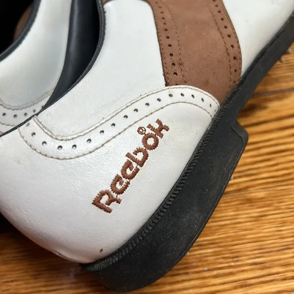 Reebok golf shoes. Size 9. White/brown saddle Oxford style. Good used condition.