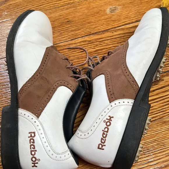 Reebok golf shoes. Size 9. White/brown saddle Oxford style. Good used condition.
