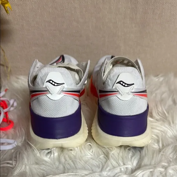 Saucony White and Orange Athletic Shoes with PWRRUN Cushioning