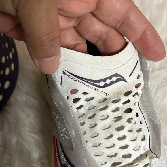 Saucony White and Orange Athletic Shoes with PWRRUN Cushioning