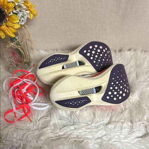 Saucony White and Orange Athletic Shoes with PWRRUN Cushioning